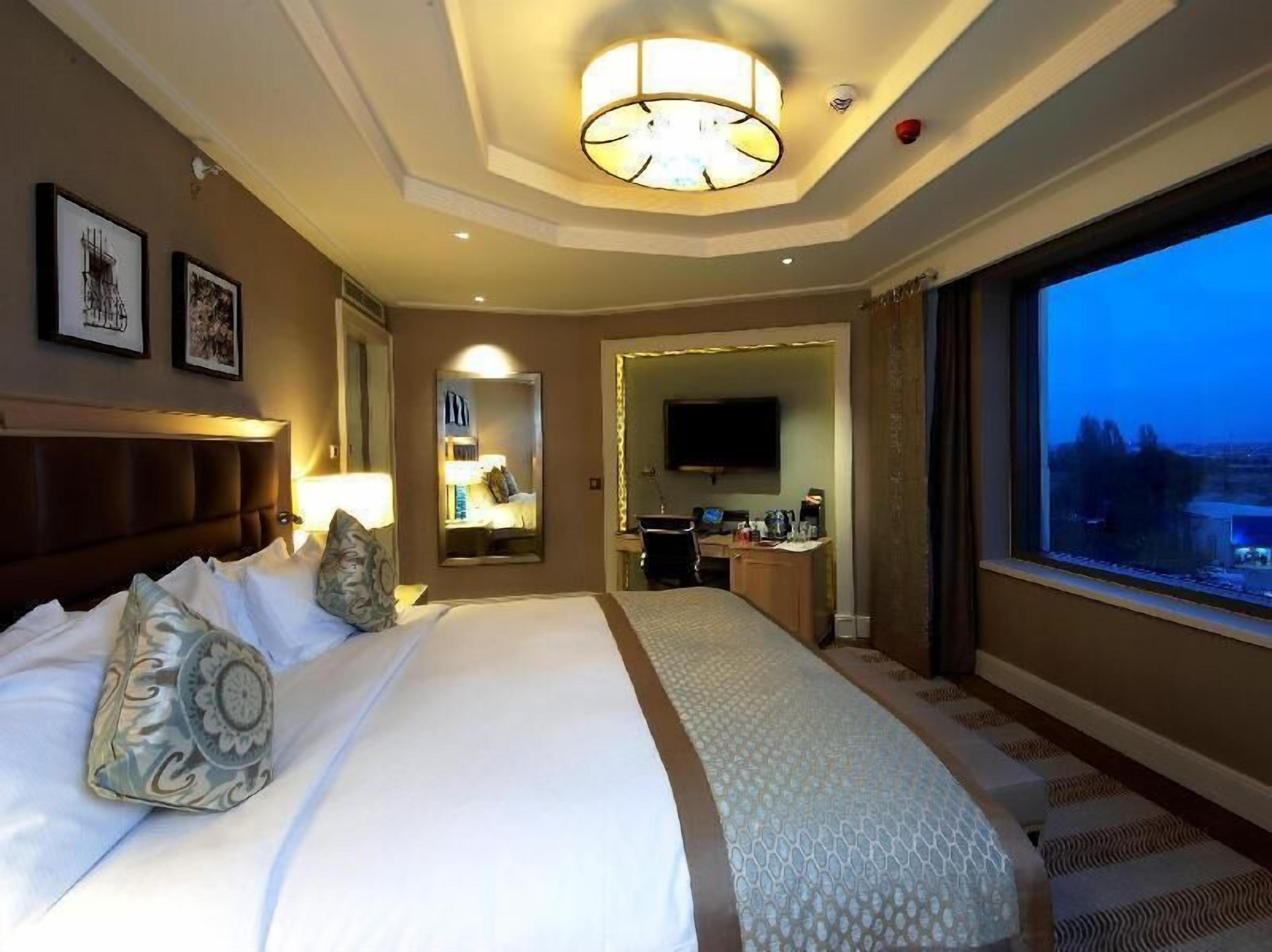 Premium bedding, in-room safe, desk, soundproofing
