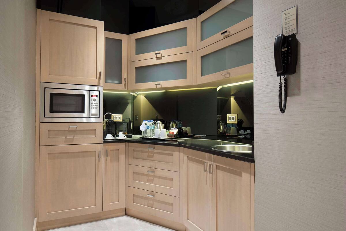 presidential suite | private kitchen | fridge, coffee/tea maker, high chair