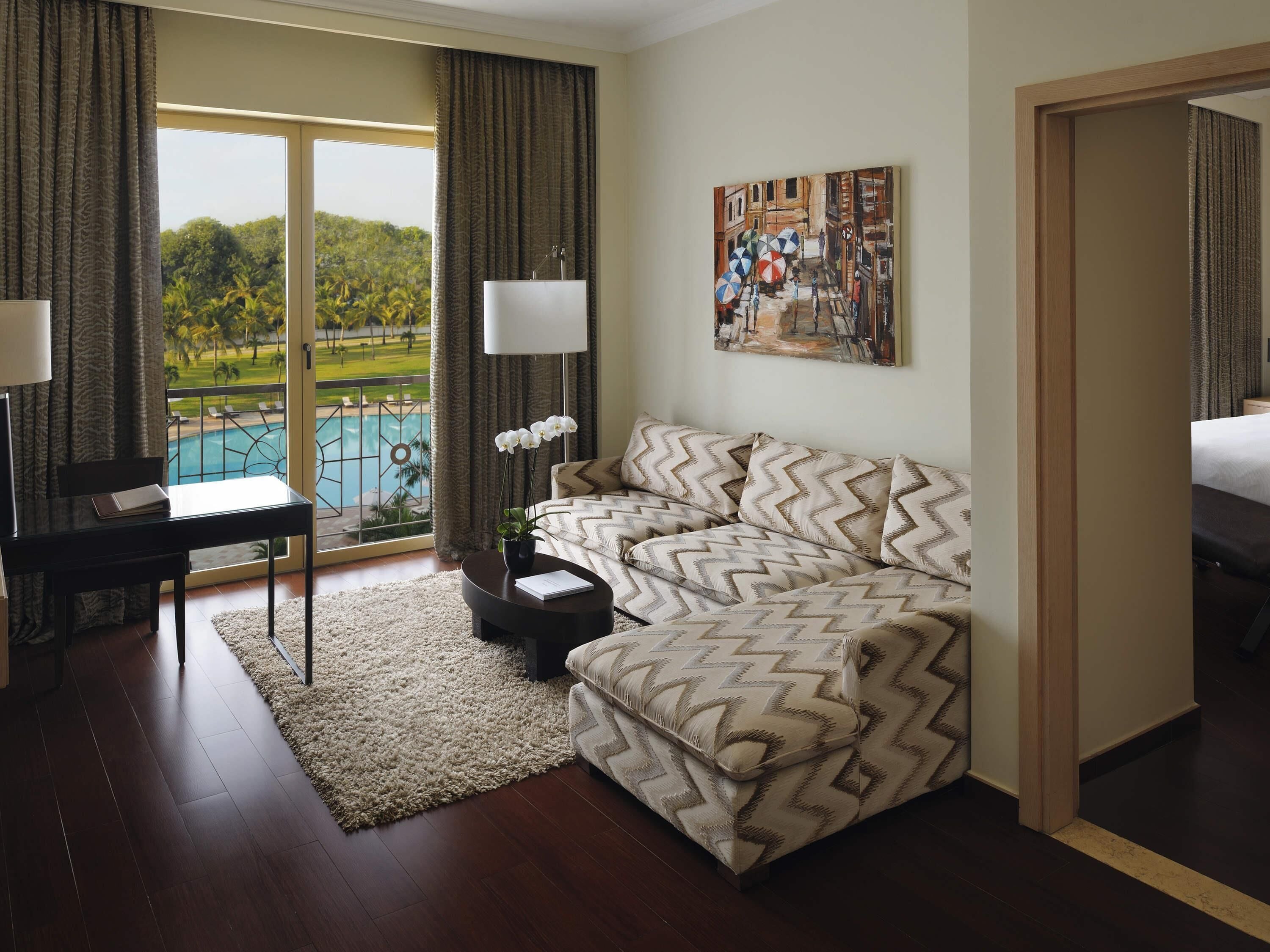 Executive Suite, 1 King Bed, Pool View | Premium bedding, minibar, in-room safe, individually furnished