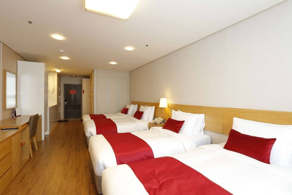 Deluxe Room, Multiple Beds, Non Smoking | In-room safe, desk, iron/ironing board, free WiFi