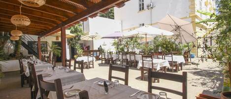 Breakfast, lunch, dinner served; Moroccan cuisine, al fresco dining