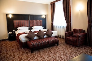 Premium bedding, down duvets, in-room safe, rollaway beds