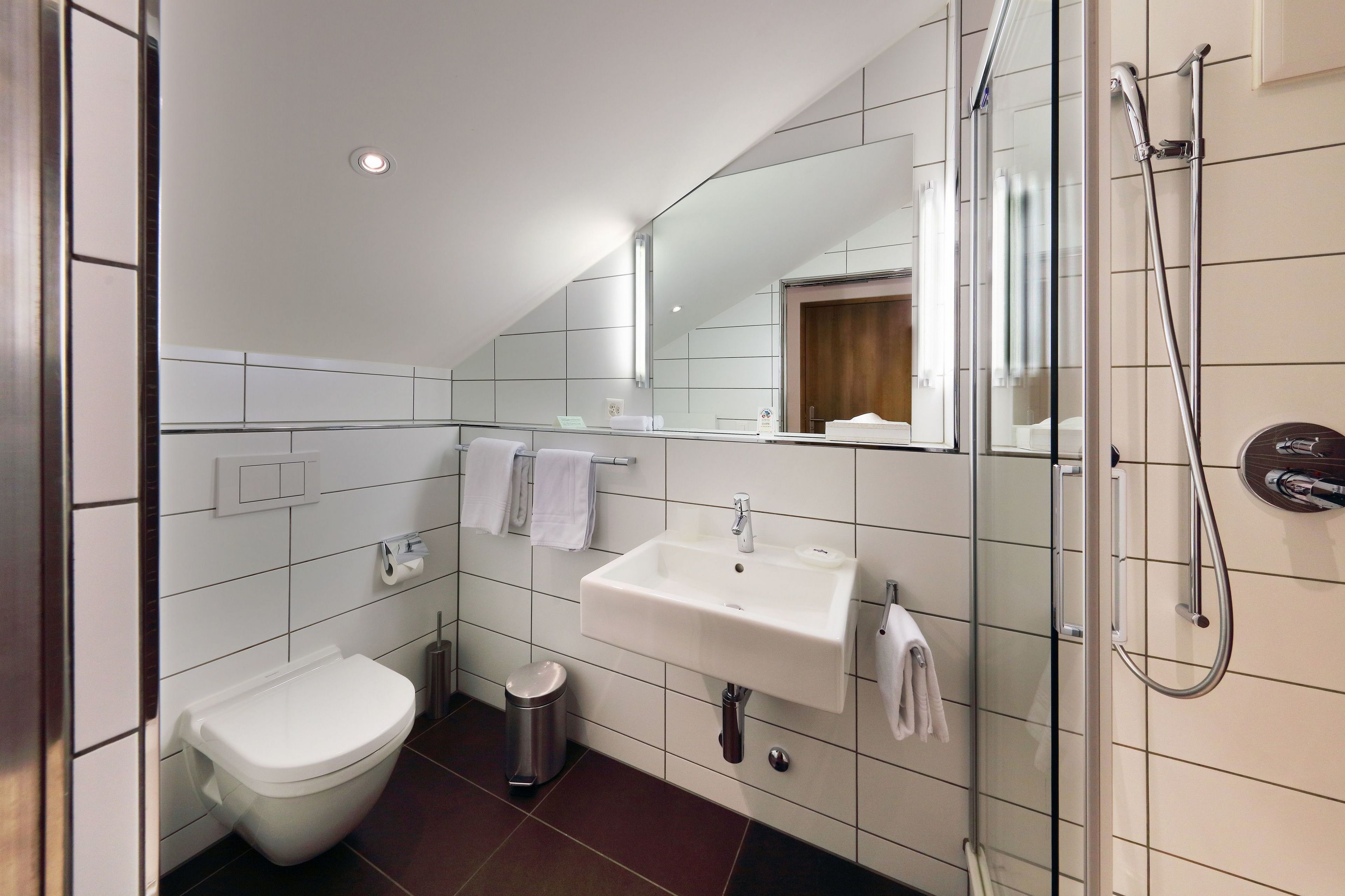 single room | bathroom | hair dryer, slippers, towels, soap