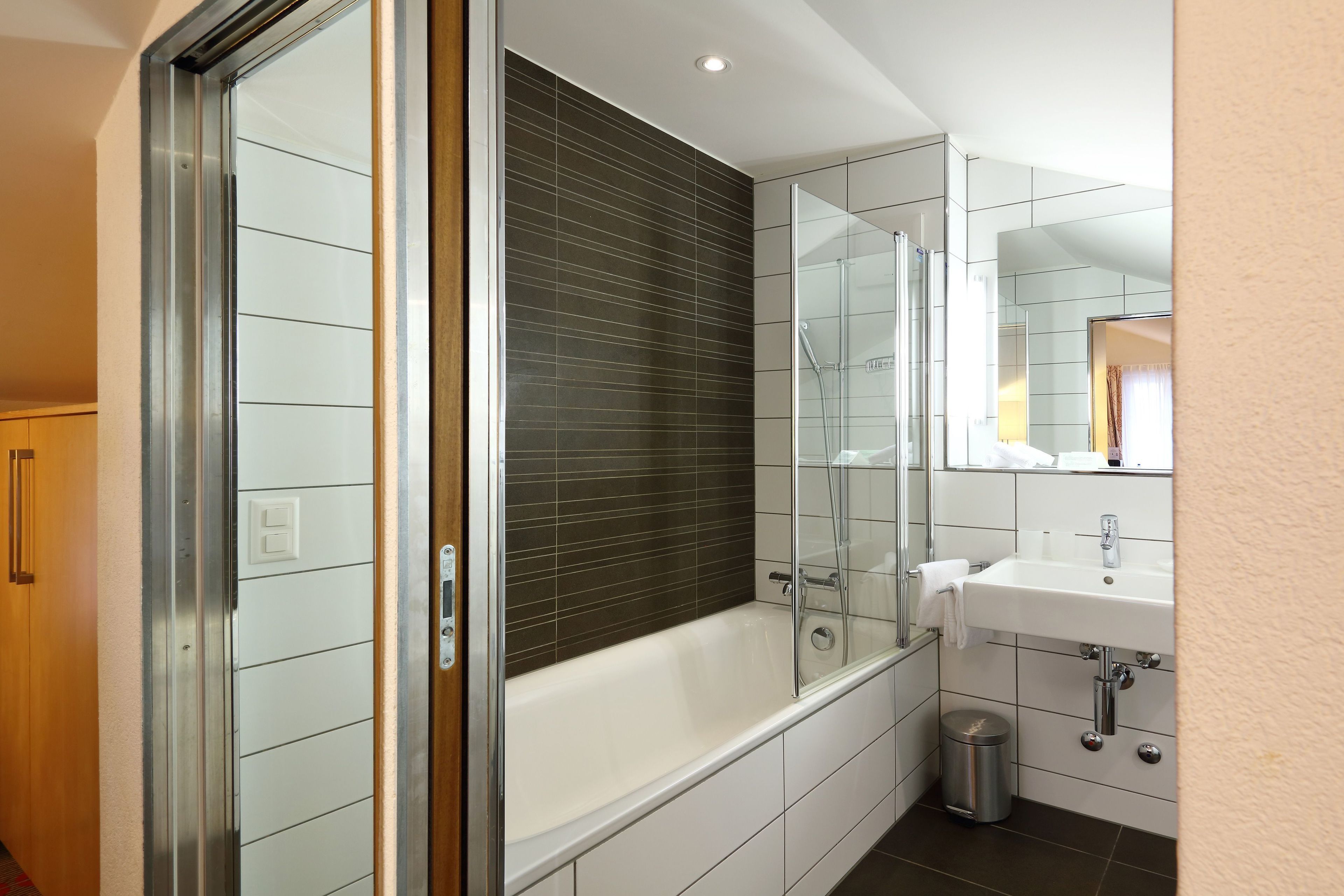 hair dryer, slippers, towels, soap