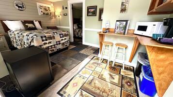 2 bedrooms, blackout curtains, iron/ironing board, cots/infant beds