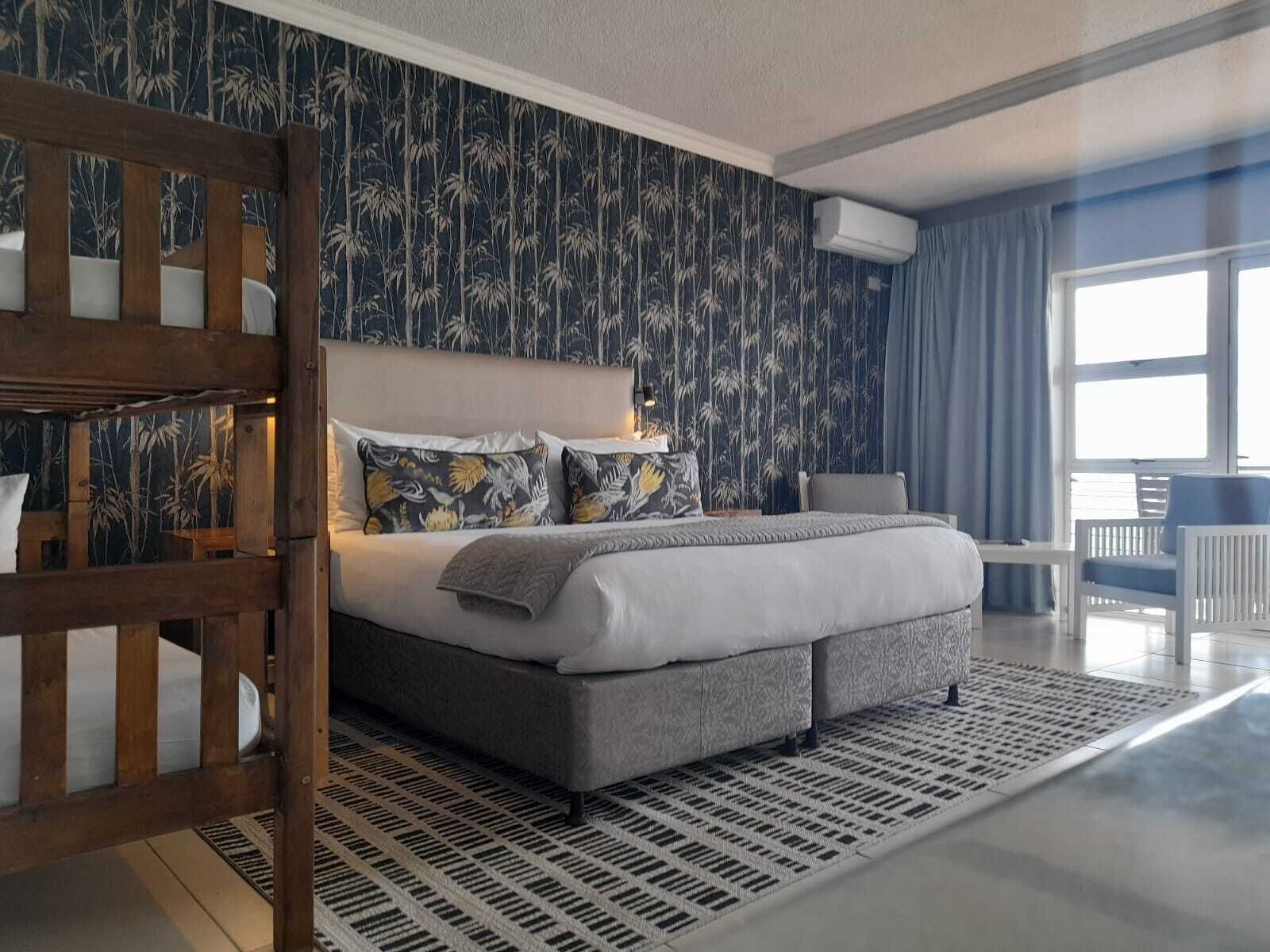 standard quadruple room | in-room safe, desk, blackout curtains, iron/ironing board