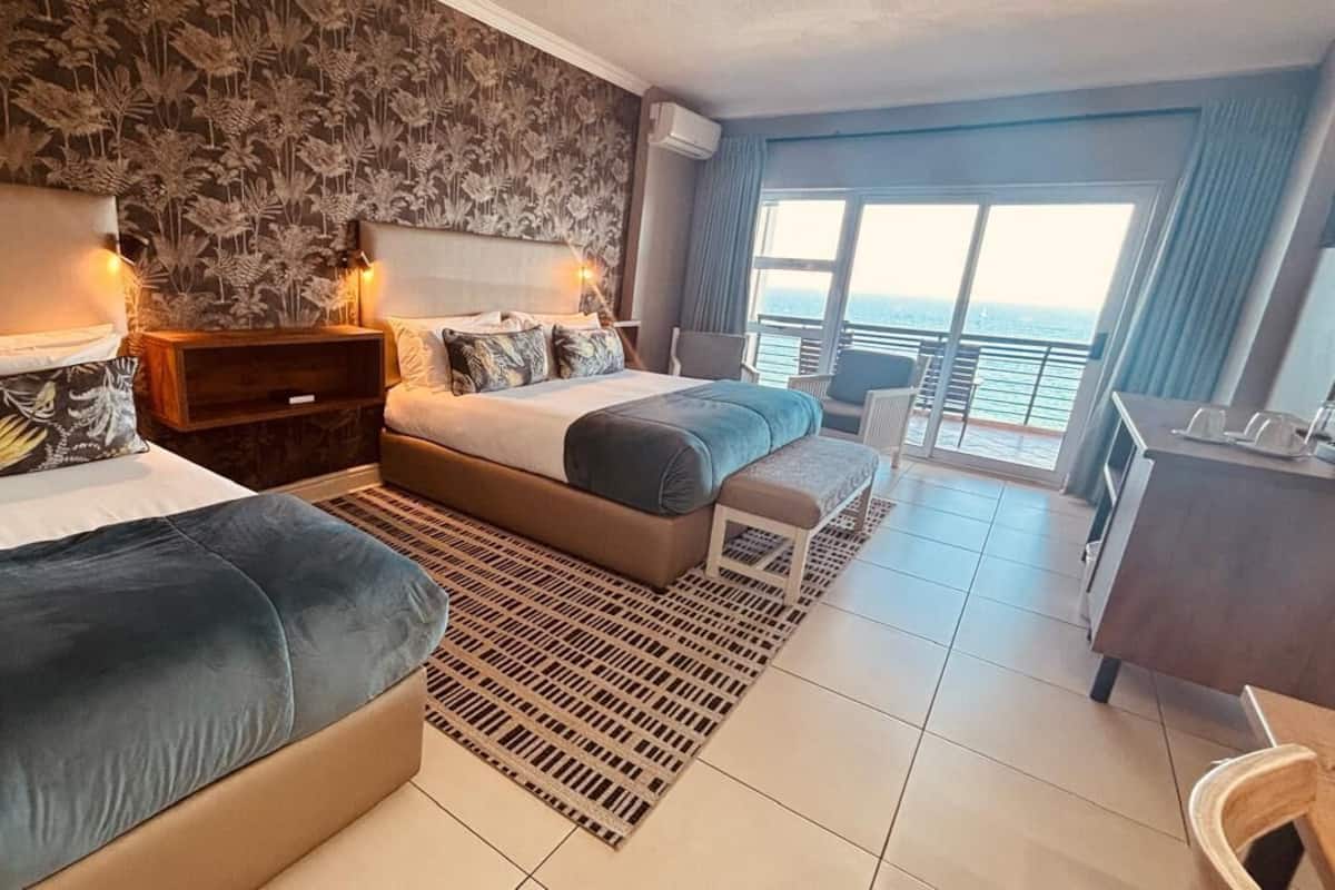 Family Room, Multiple Beds, Beach View, Beachfront (Triple) | In-room safe, desk, blackout drapes, iron/ironing board (on request)