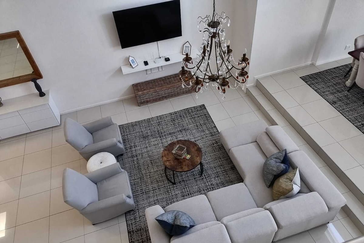 Penthouse (Beach Club) | Living area | 32-inch TV with satellite channels