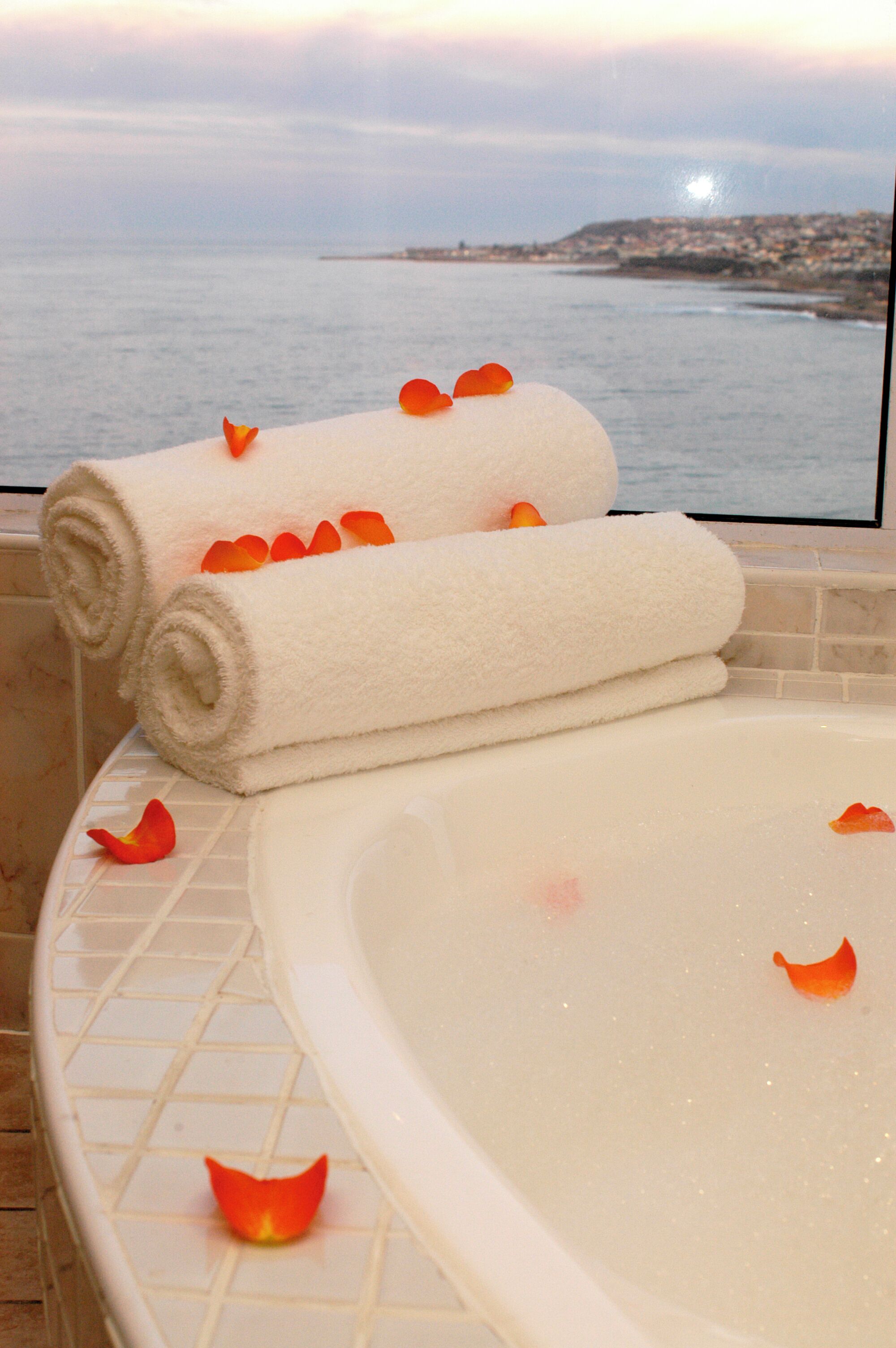 honeymoon suite | bathroom | separate bathtub and shower, towels
