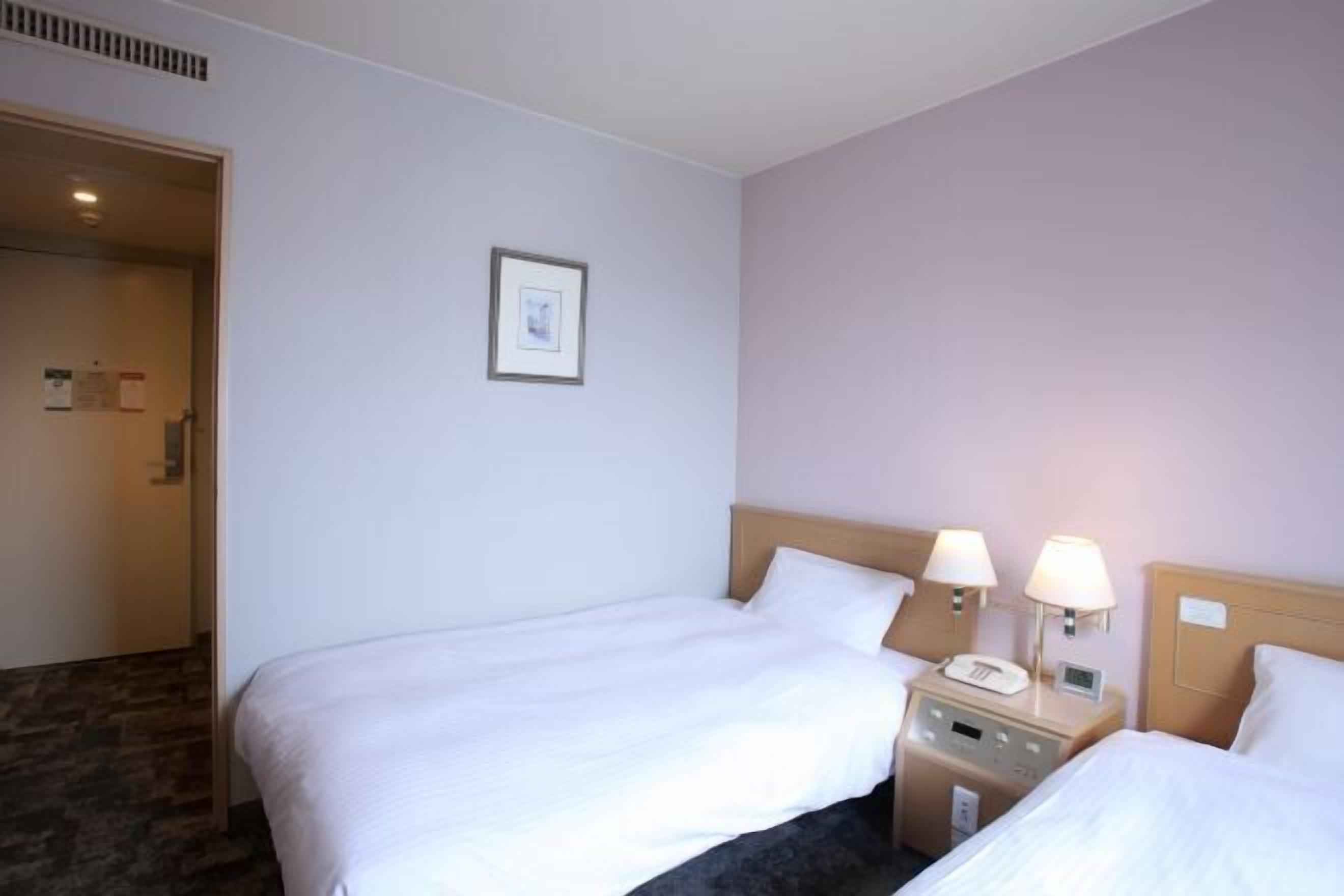 Down comforters, desk, free WiFi, bed sheets