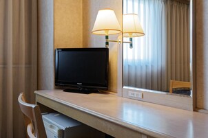 Down comforters, desk, free WiFi, bed sheets