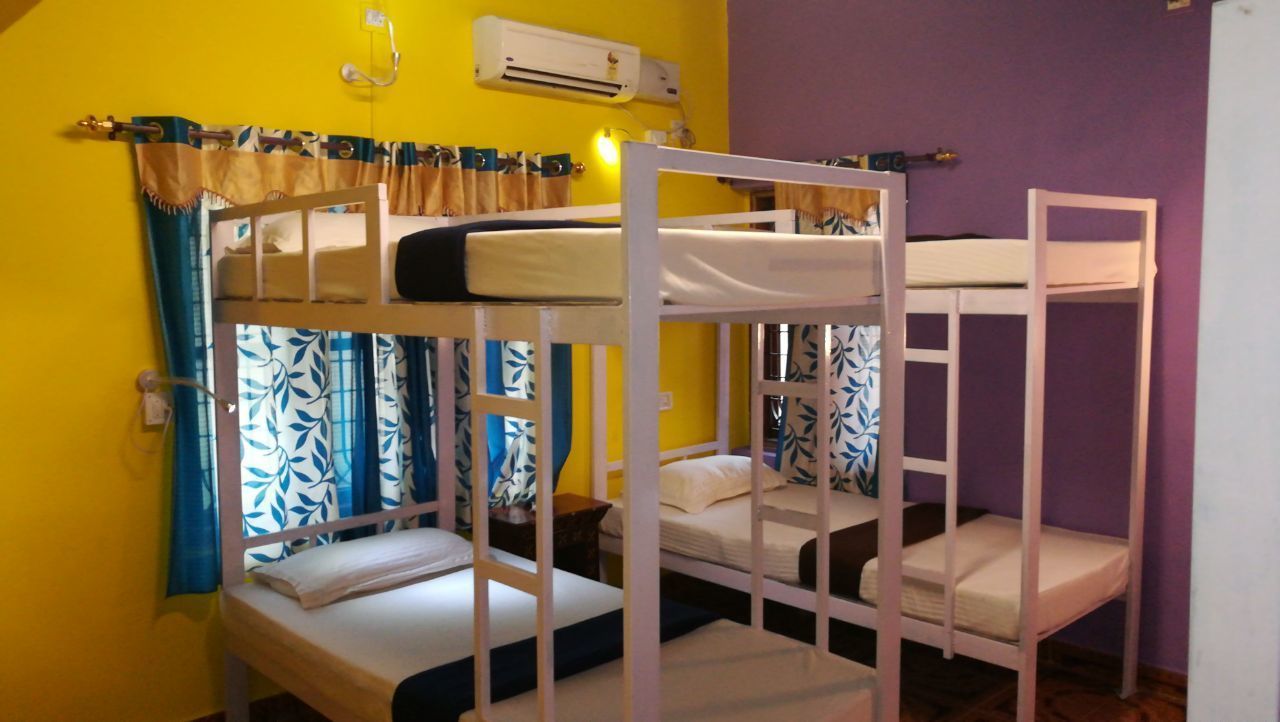 economy shared dormitory, mixed dorm, shared bathroom, ground floor | premium bedding, in-room safe, desk, blackout curtains