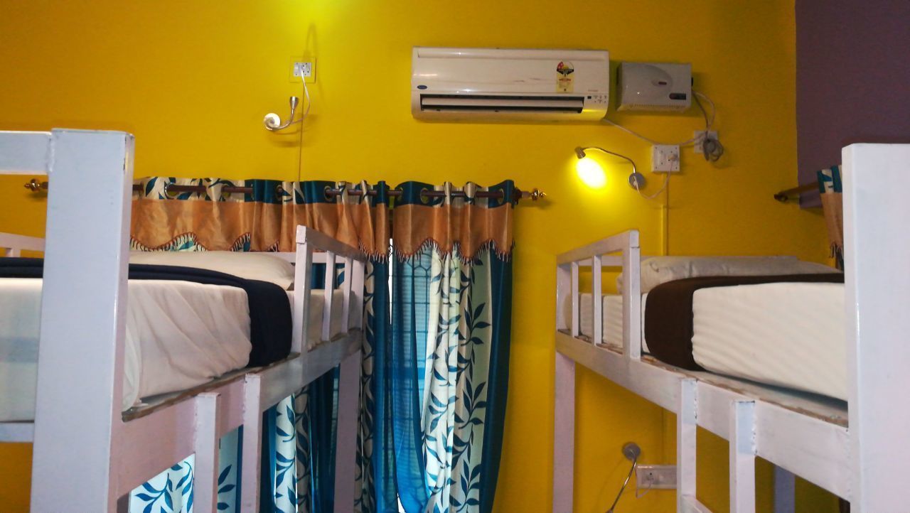 economy shared dormitory, mixed dorm, shared bathroom, ground floor | premium bedding, in-room safe, desk, blackout curtains