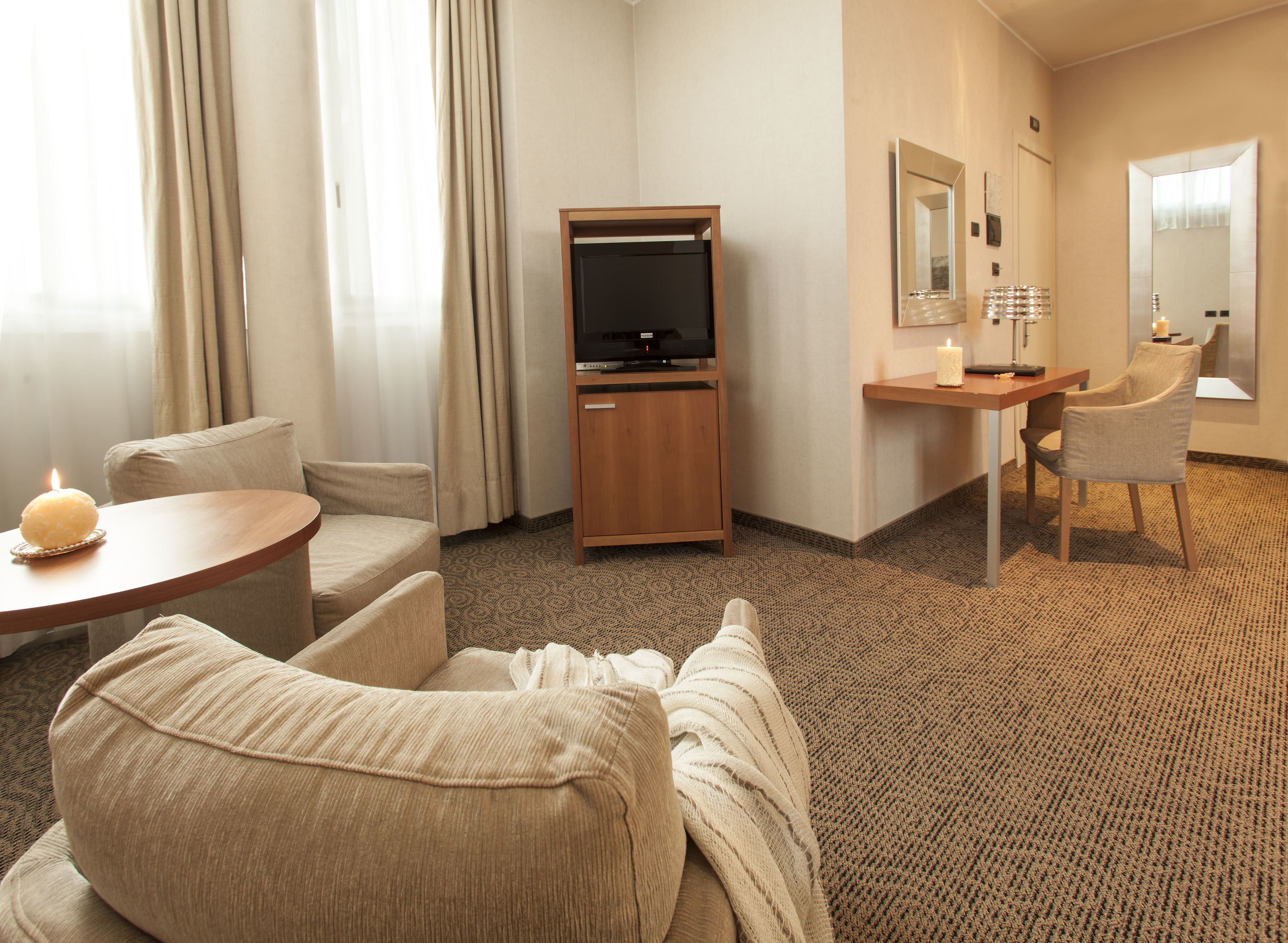 premium bedding, down duvets, minibar, in-room safe