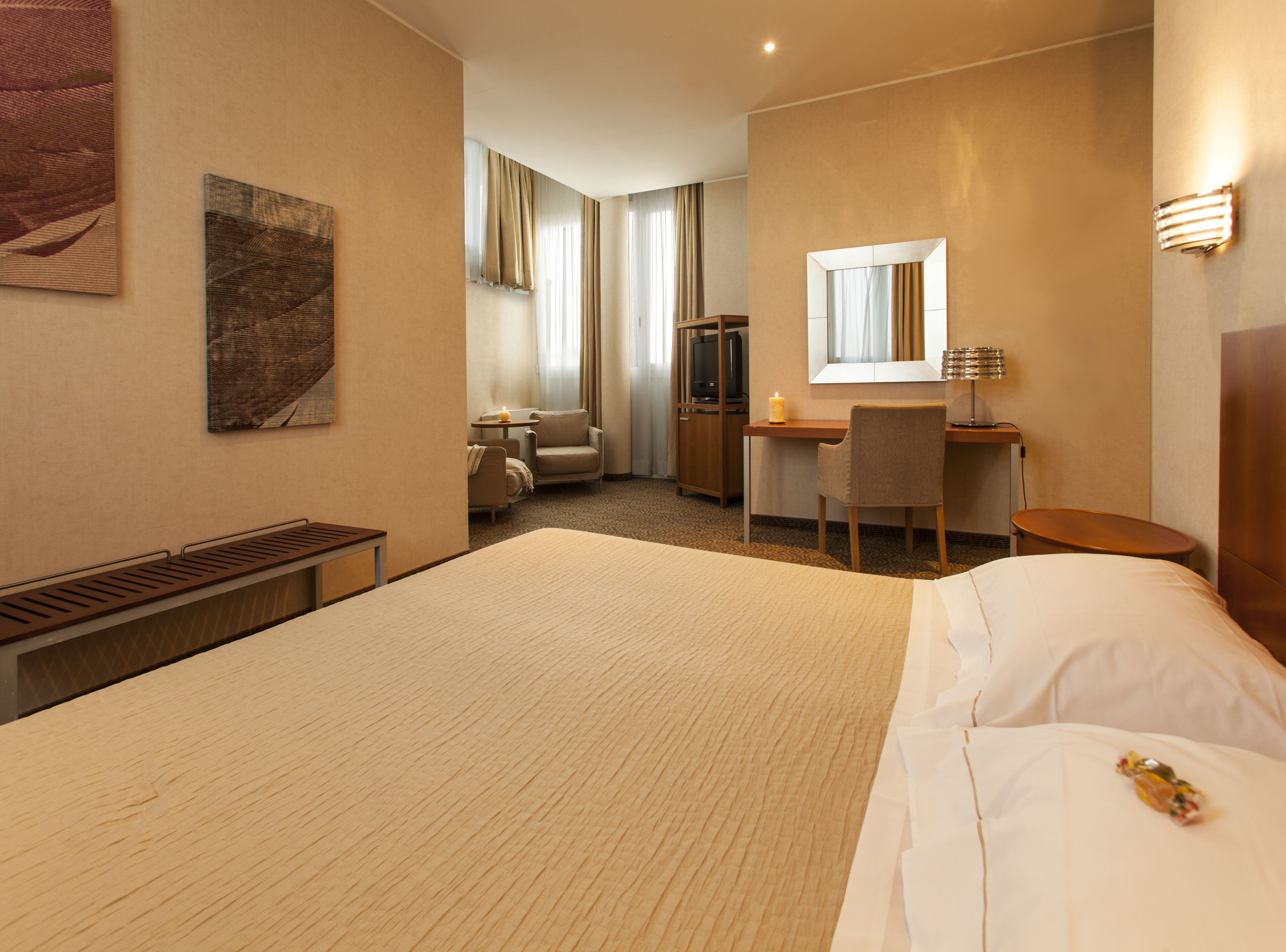 premium bedding, down duvets, minibar, in-room safe