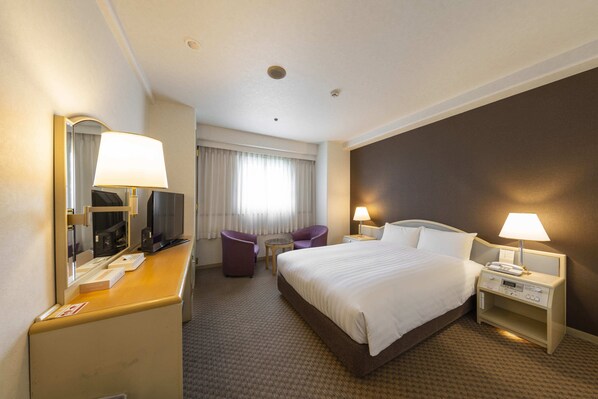 Down duvets, desk, iron/ironing board, free WiFi