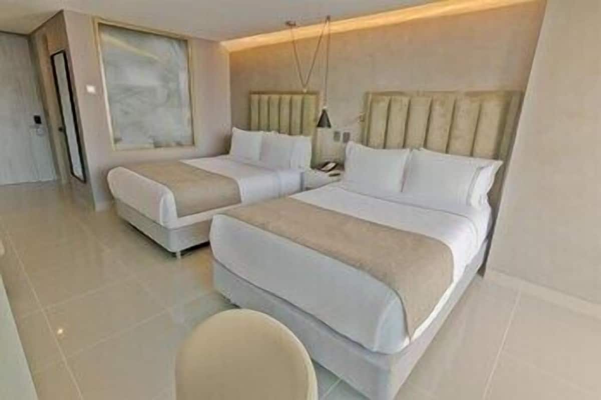 Ropa de cama de alta calidad y minibar