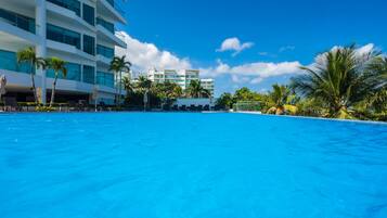 3 outdoor pools, open 9 AM to 8 PM, pool umbrellas, sun loungers