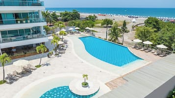 3 outdoor pools, open 9 AM to 8 PM, pool umbrellas, sun loungers