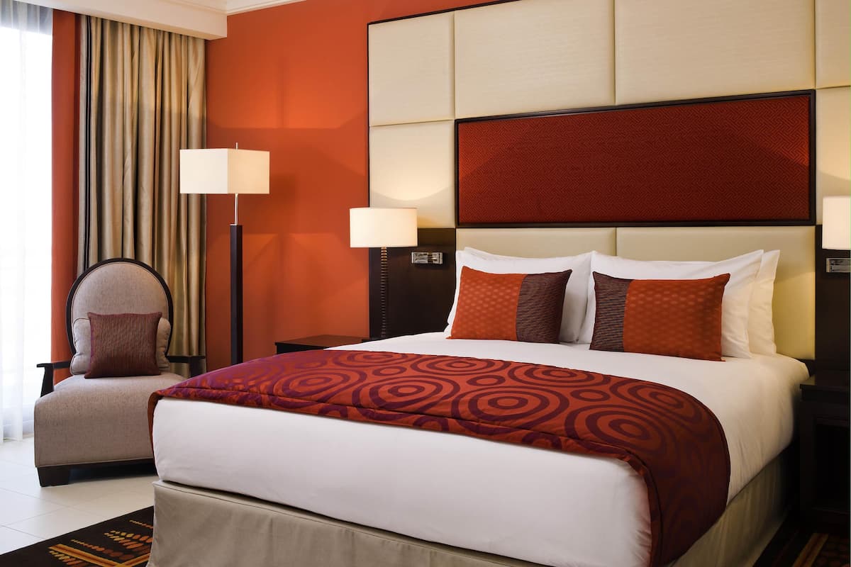 Egyptian cotton sheets, premium bedding, down duvets, minibar