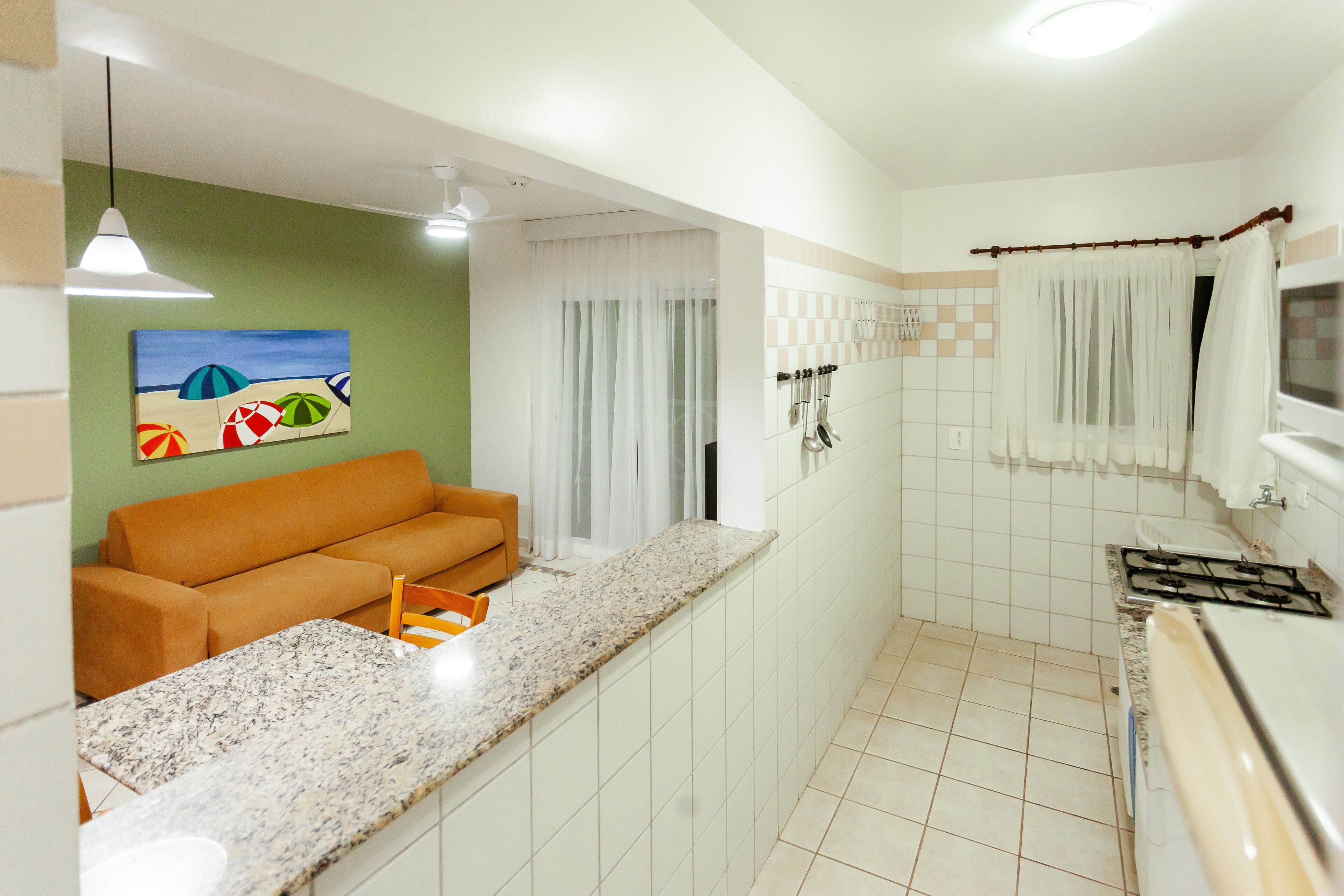 family apartment | living area | 32-inch led tv with cable channels, tv, ping pong