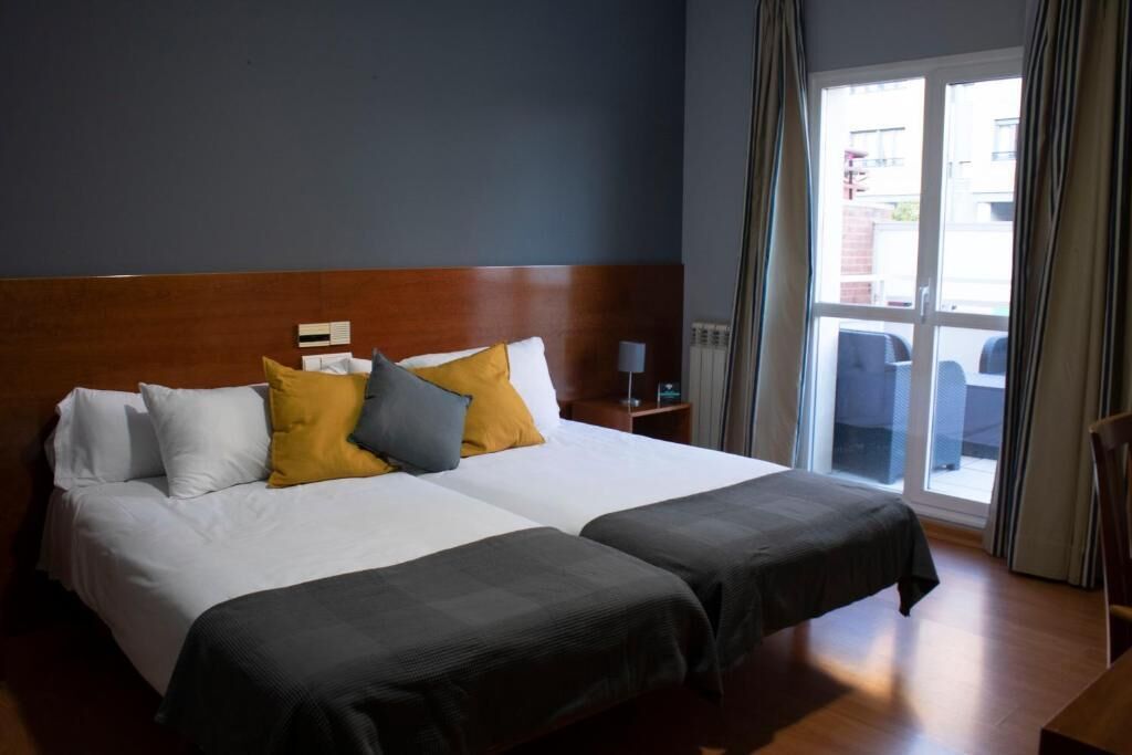 Desk, blackout curtains, free WiFi, bed sheets
