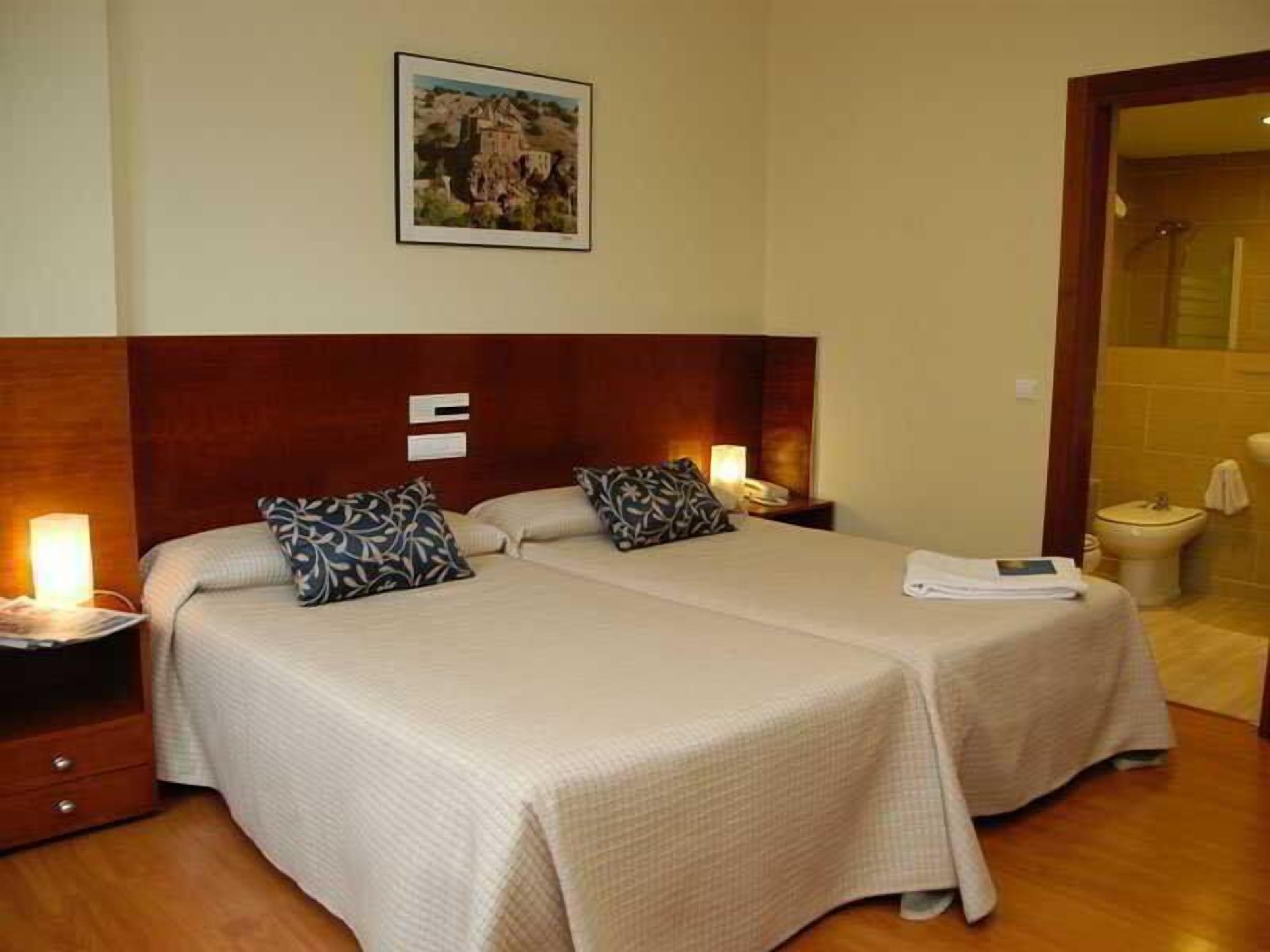 Desk, blackout curtains, free WiFi, bed sheets