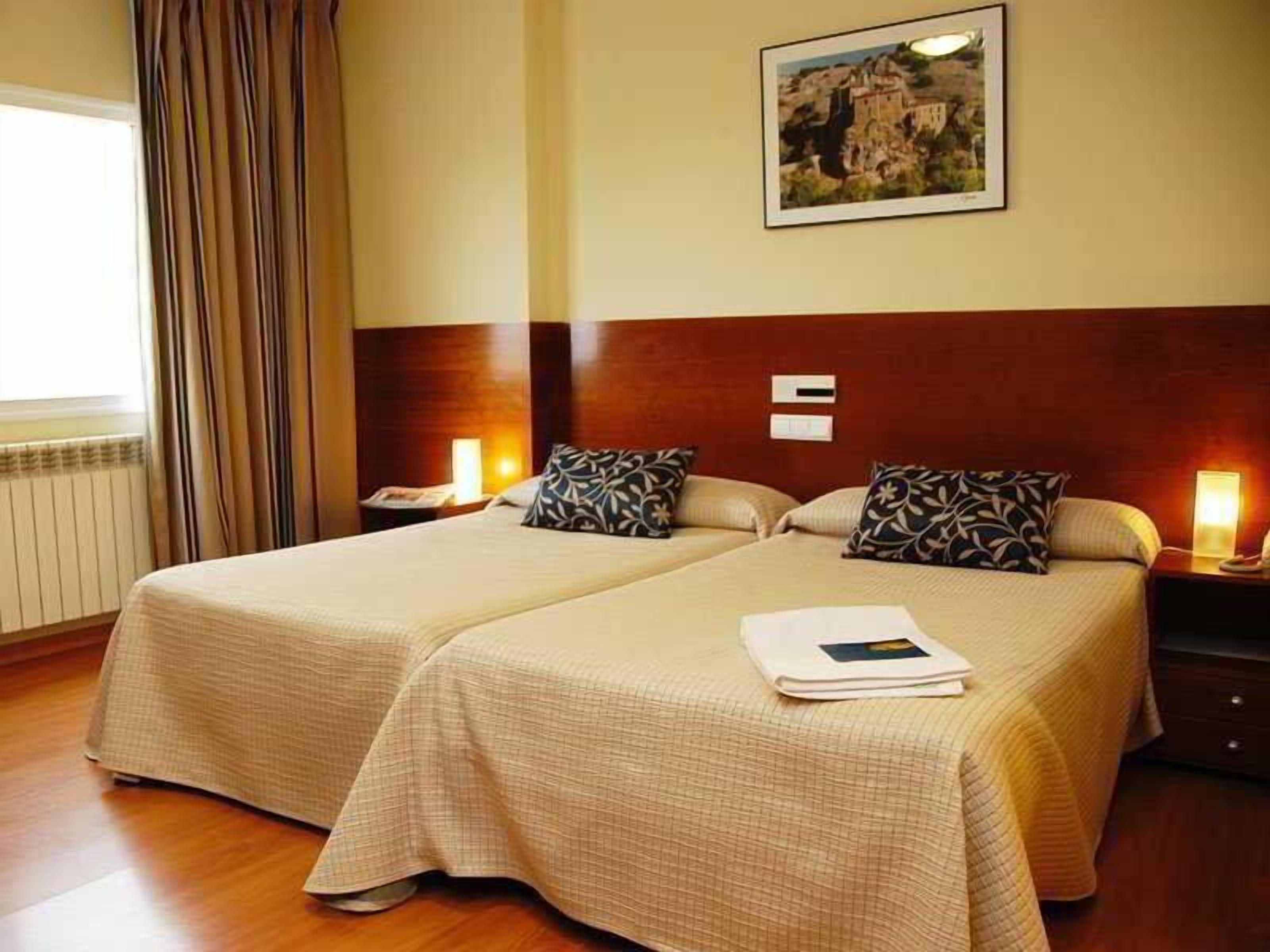 Desk, blackout curtains, free WiFi, bed sheets
