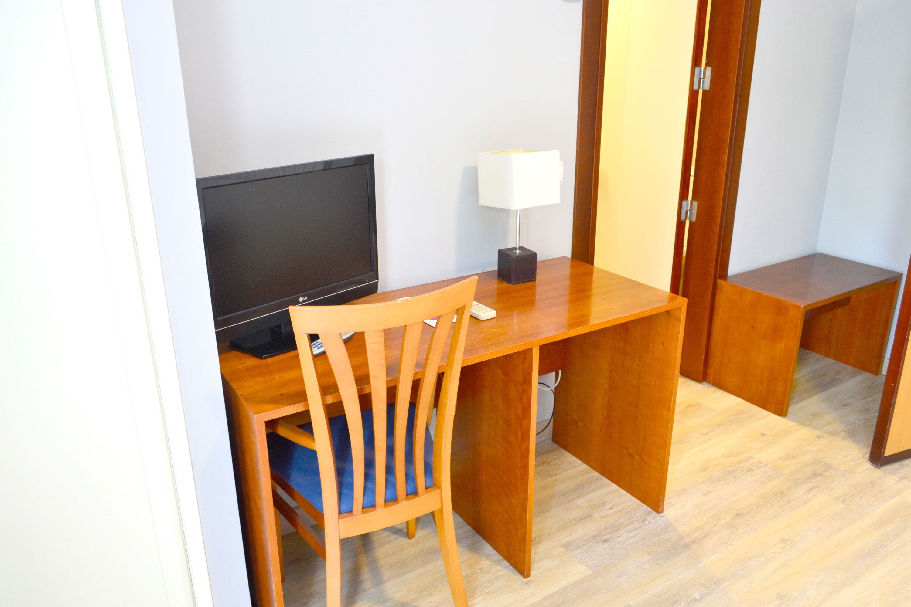 desk, blackout curtains, free wifi, bed sheets