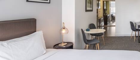 Studio Suite, 1 King Bed, Balcony | Living area | LED TV