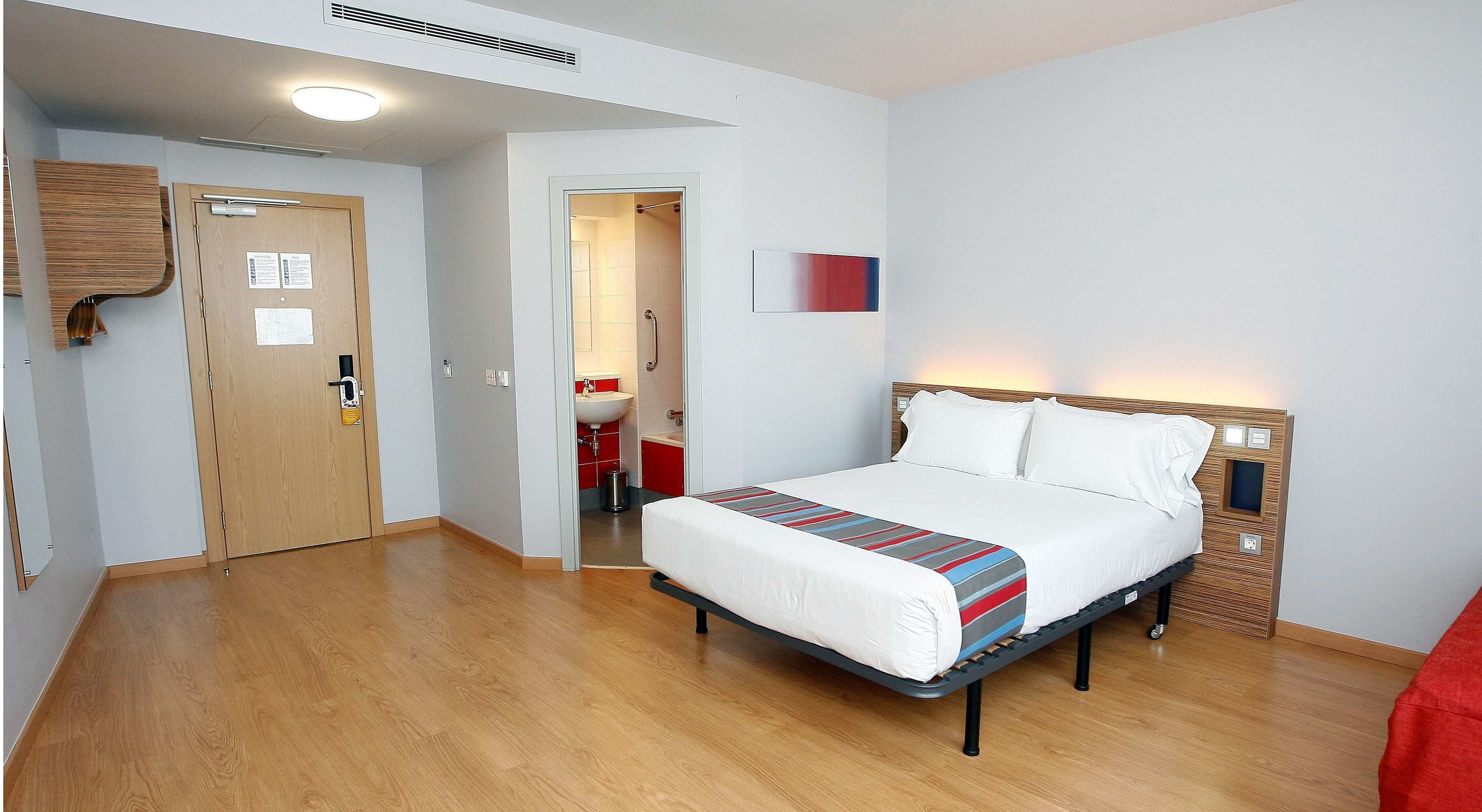 family room (min 3 people occupancy) | desk, blackout curtains, soundproofing, iron/ironing board