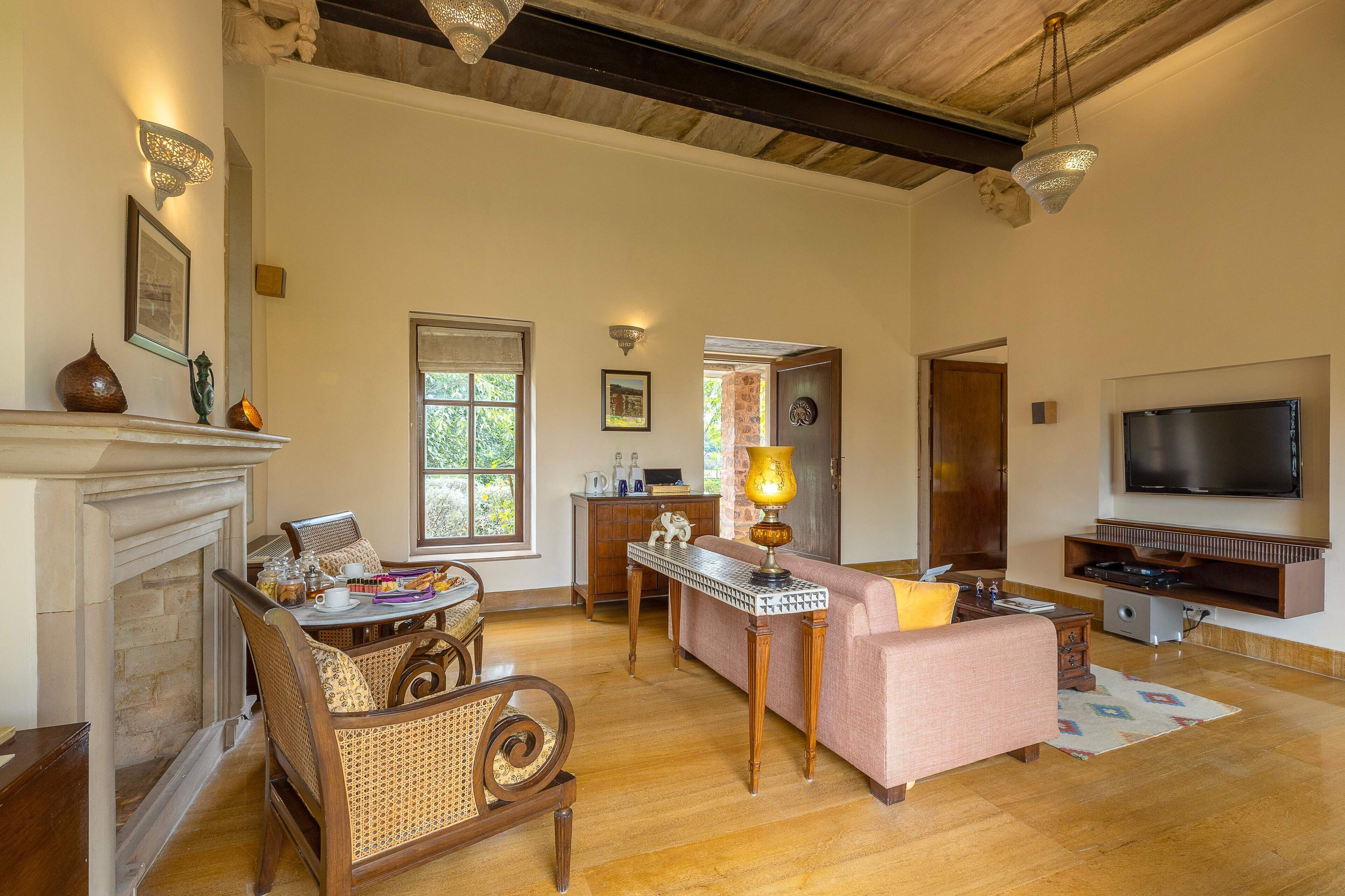 luxury garden & spa villa | living area | 42-inch lcd tv with satellite channels, tv