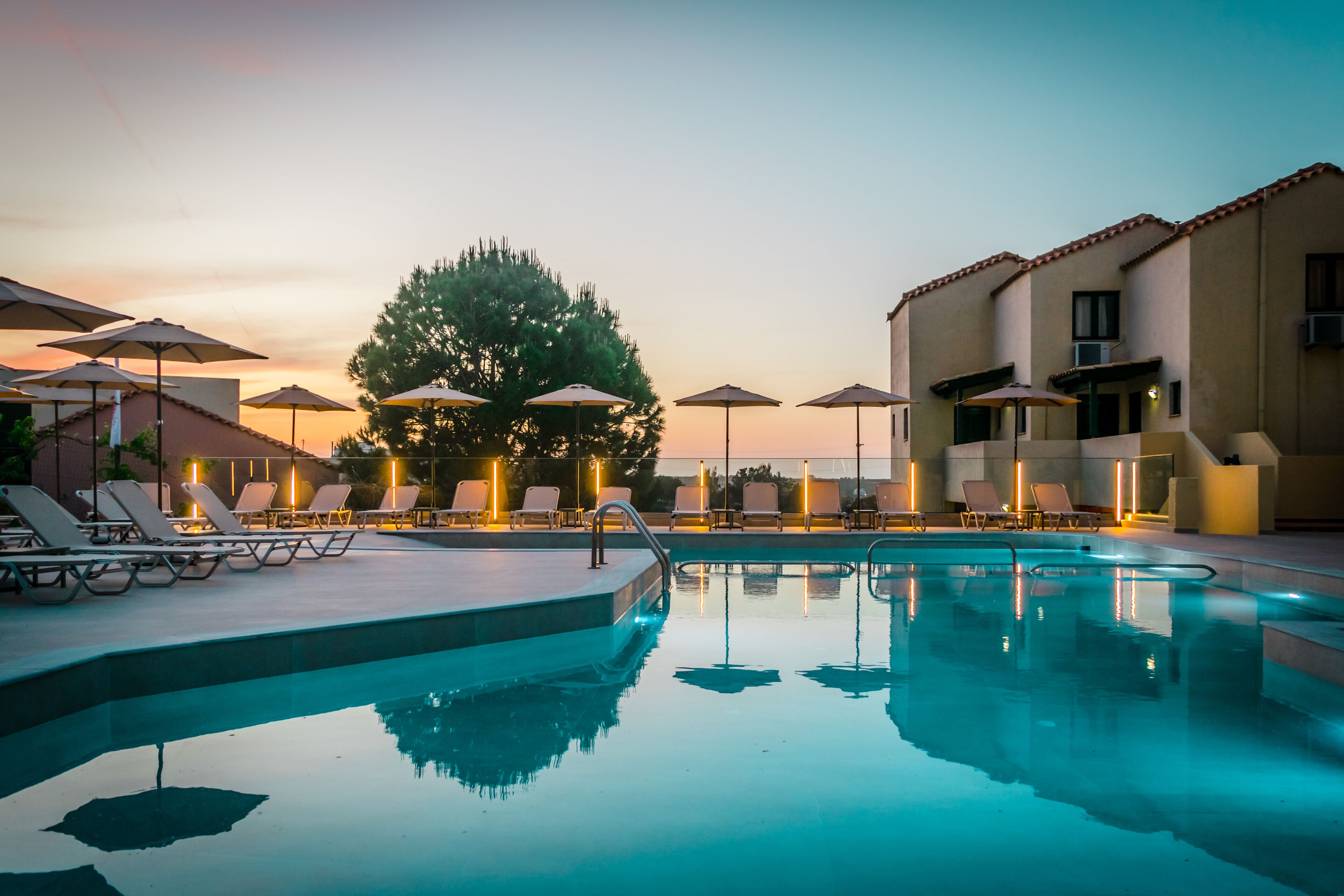 Outdoor pool, pool umbrellas, sun loungers