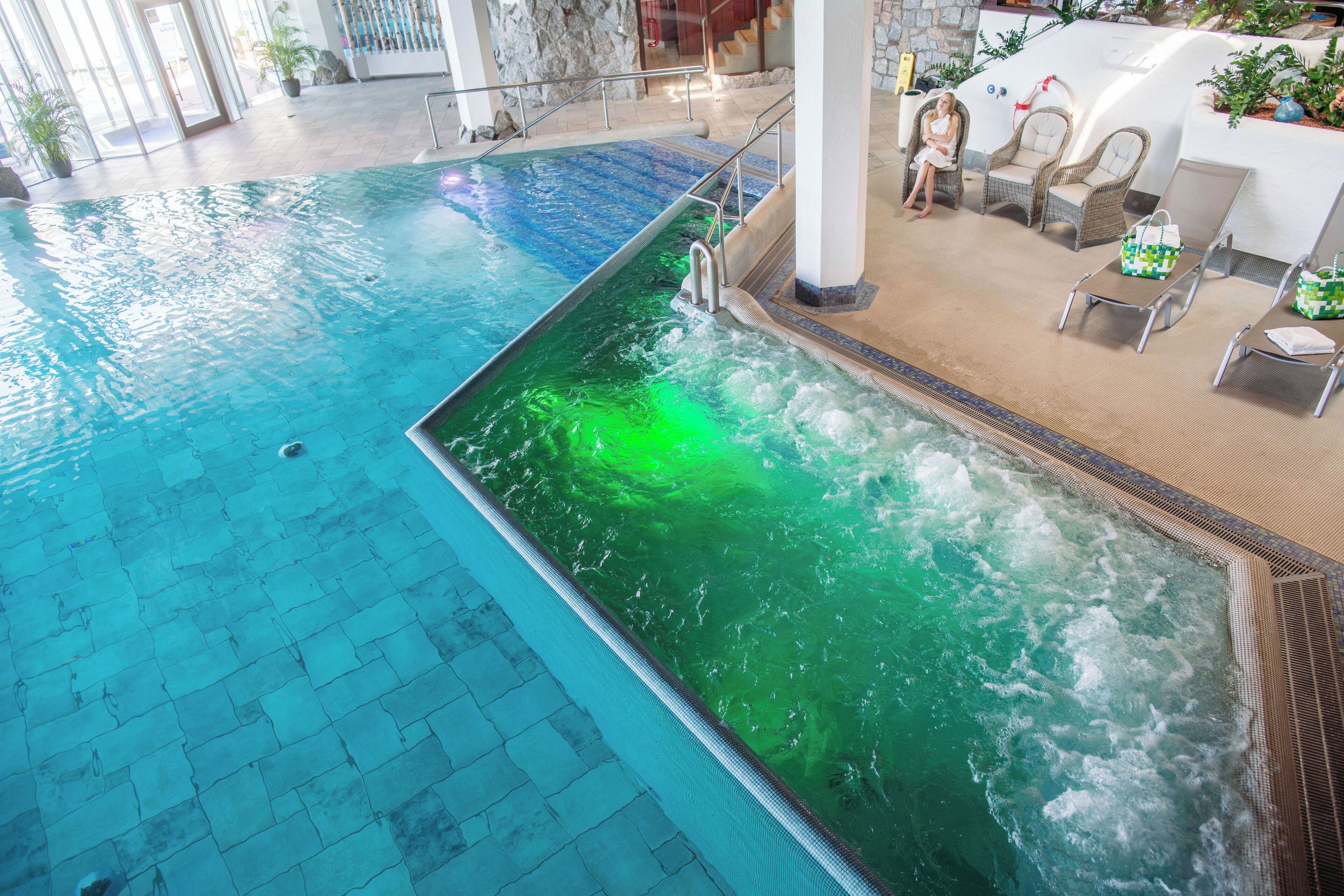 indoor pool, outdoor pool, pool umbrellas, pool loungers