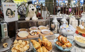 A buffet area with various food items, including pastries, fruits, and dairy products. - Vier Jahreszeiten am Schluchsee (Schluchsee)