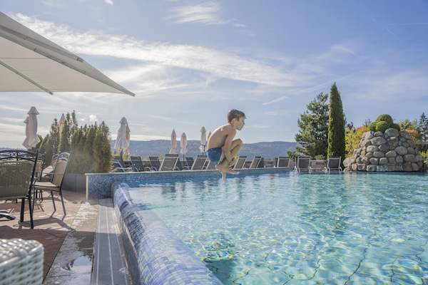 Indoor pool, outdoor pool, pool umbrellas, pool loungers