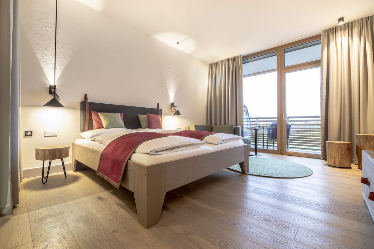 double room natur with balcony or terrace and access to the spa | premium bedding, free minibar, in-room safe, individually decorated