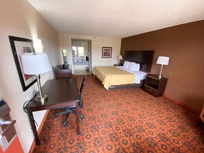 Desk, laptop workspace, blackout curtains, iron/ironing board