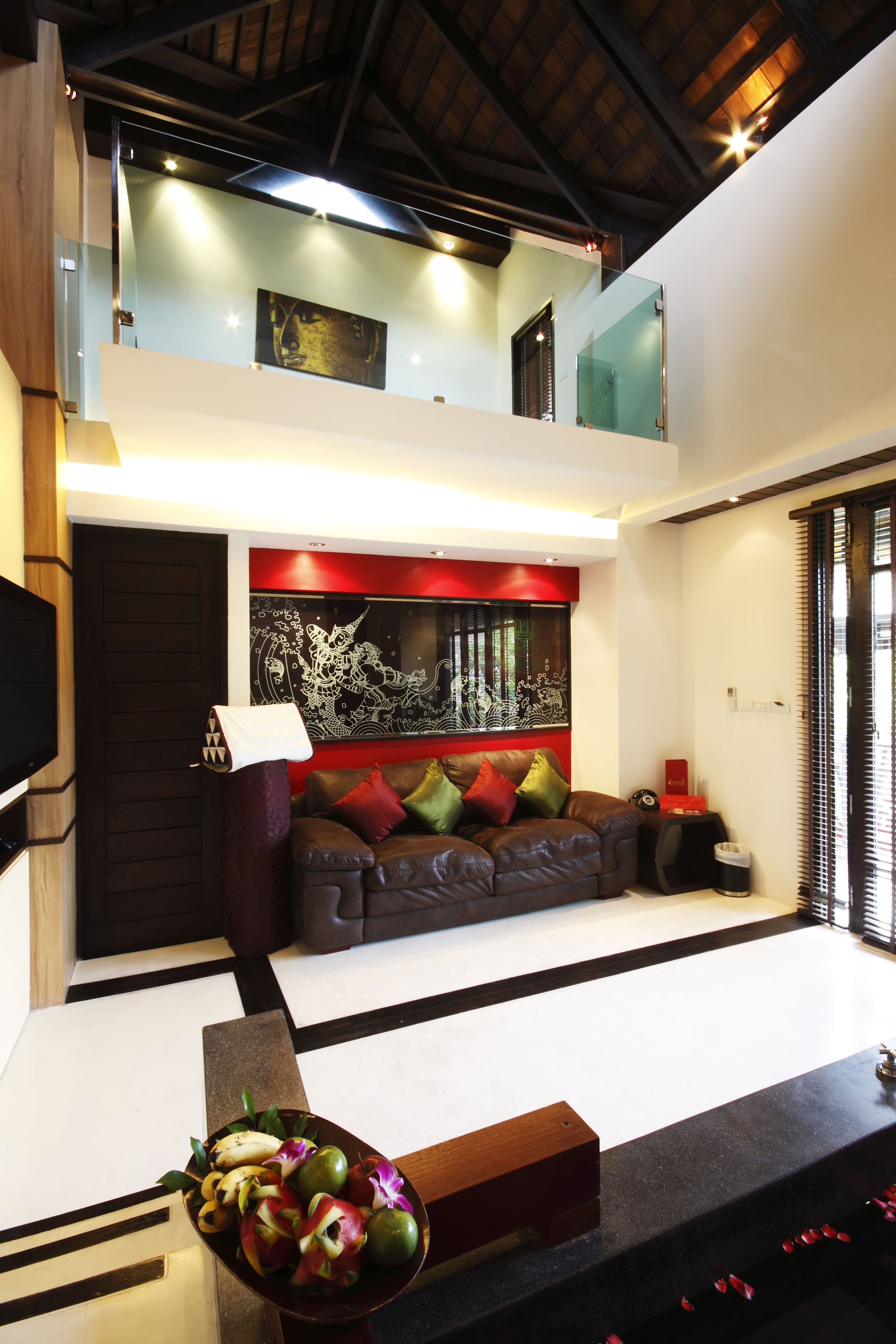 duplex suite | living area | 32-inch lcd tv with cable channels, tv, dvd player