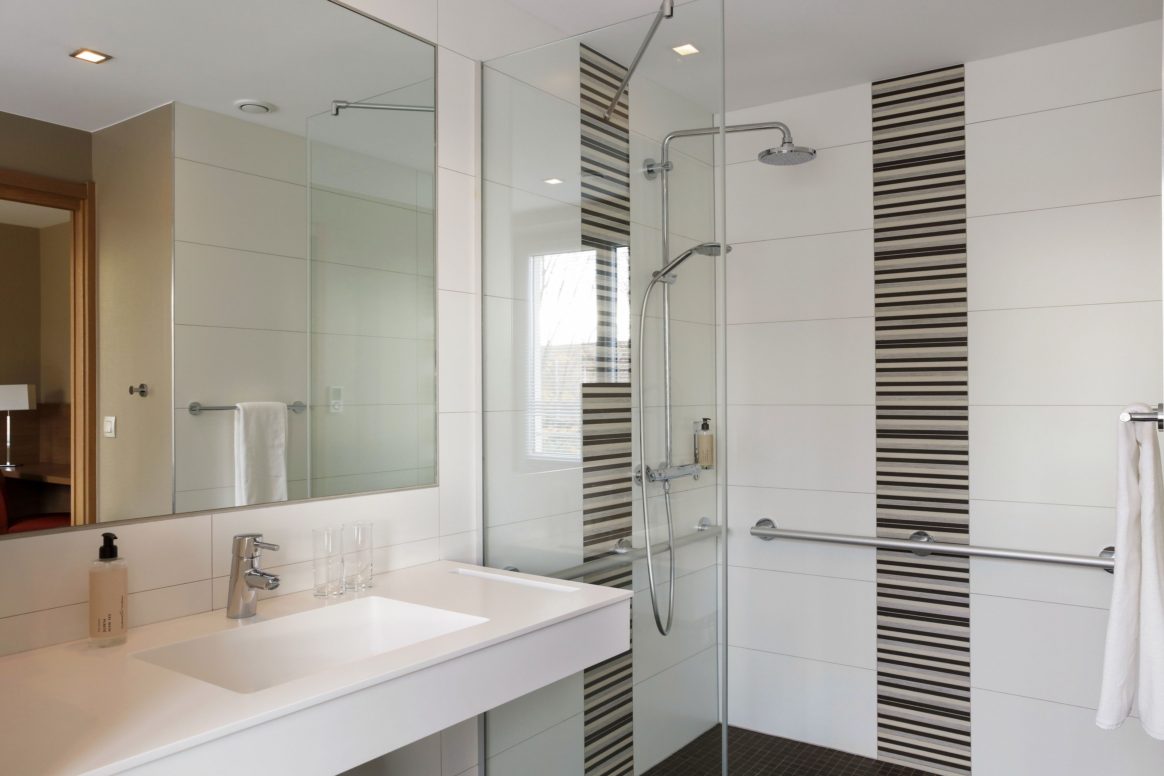 comfort room, 1 queen bed | bathroom | hair dryer, towels