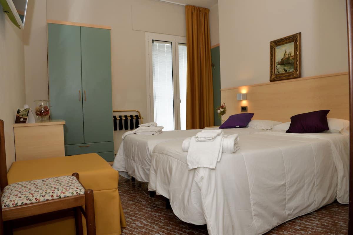 Desk, blackout drapes, free WiFi, bed sheets
