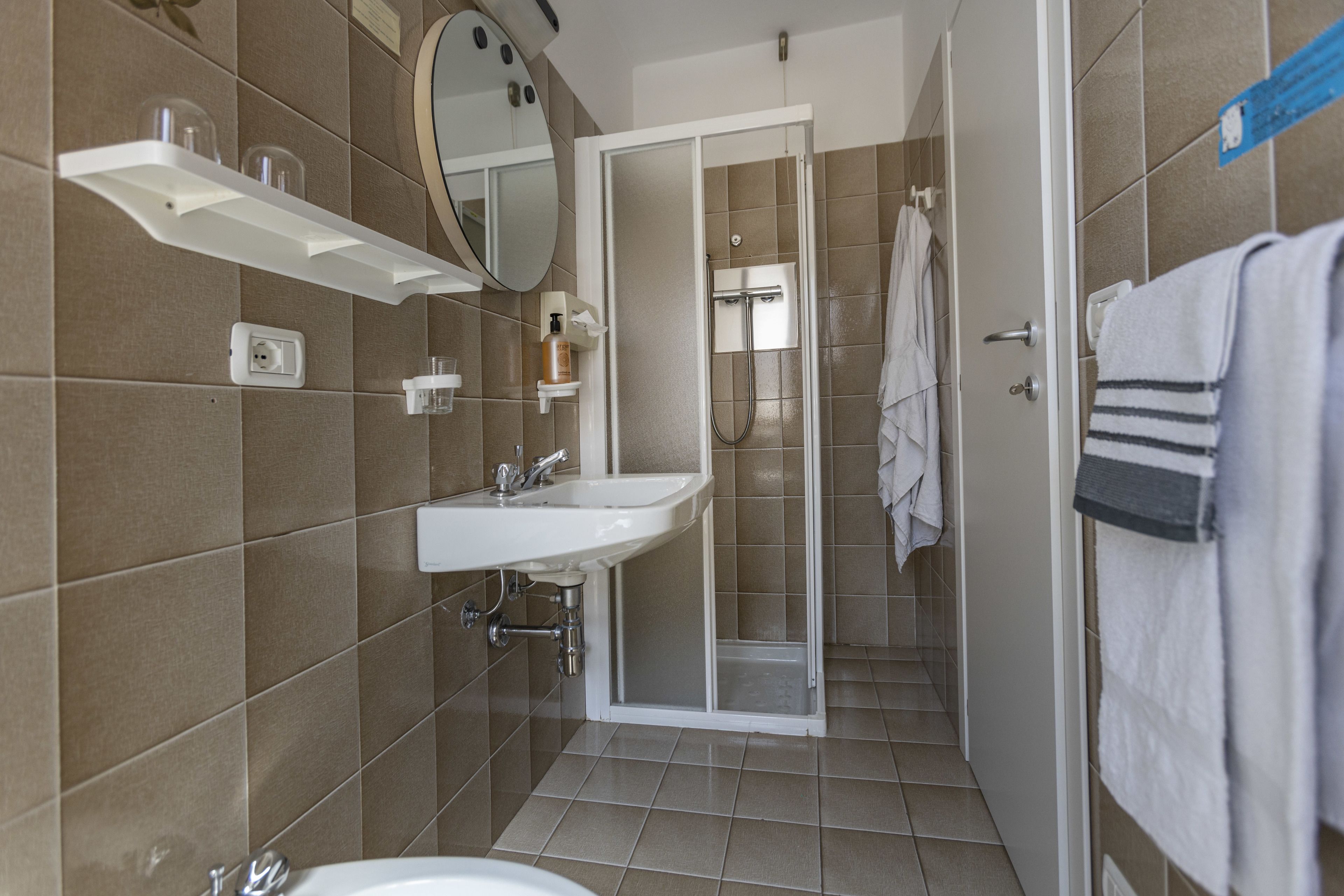 double or twin room | bathroom | shower, hair dryer, bidet, towels