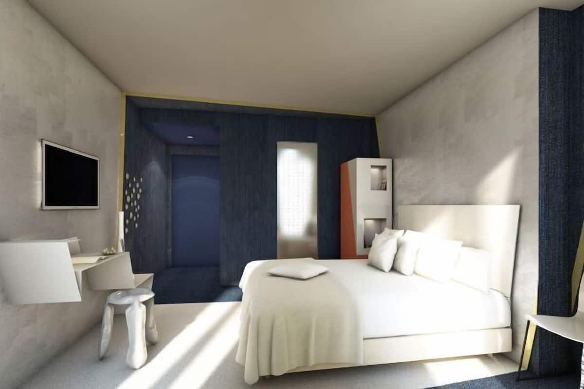 Biancheria da letto di alta qualità, minibar, cassaforte in camera