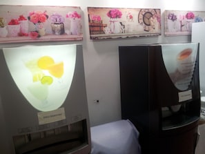 Enjoy a convenient stay with a wall-mounted coffee machine and a standard refrigerator.
