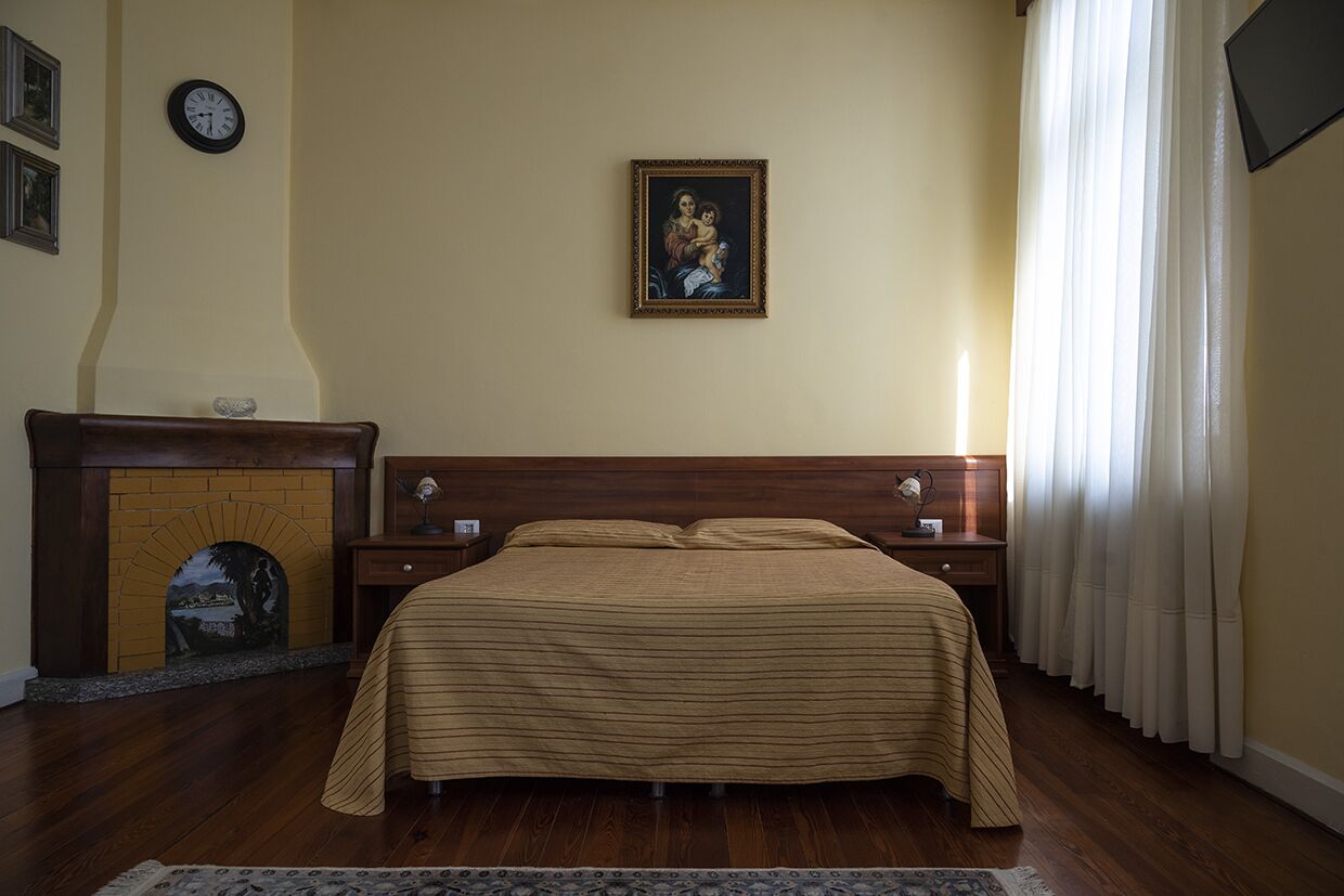 superior quadruple room, lake view | in-room safe, desk, free cots/infant beds, rollaway beds