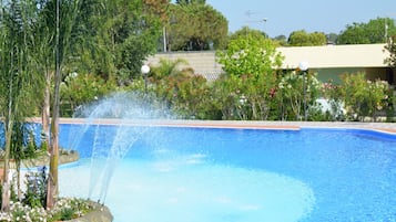 Seasonal outdoor pool, pool umbrellas