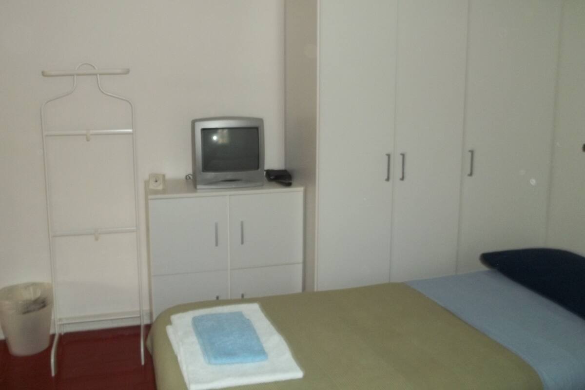 Family Triple Room (Camera Residence) | Laptop workspace, iron/ironing board, free WiFi