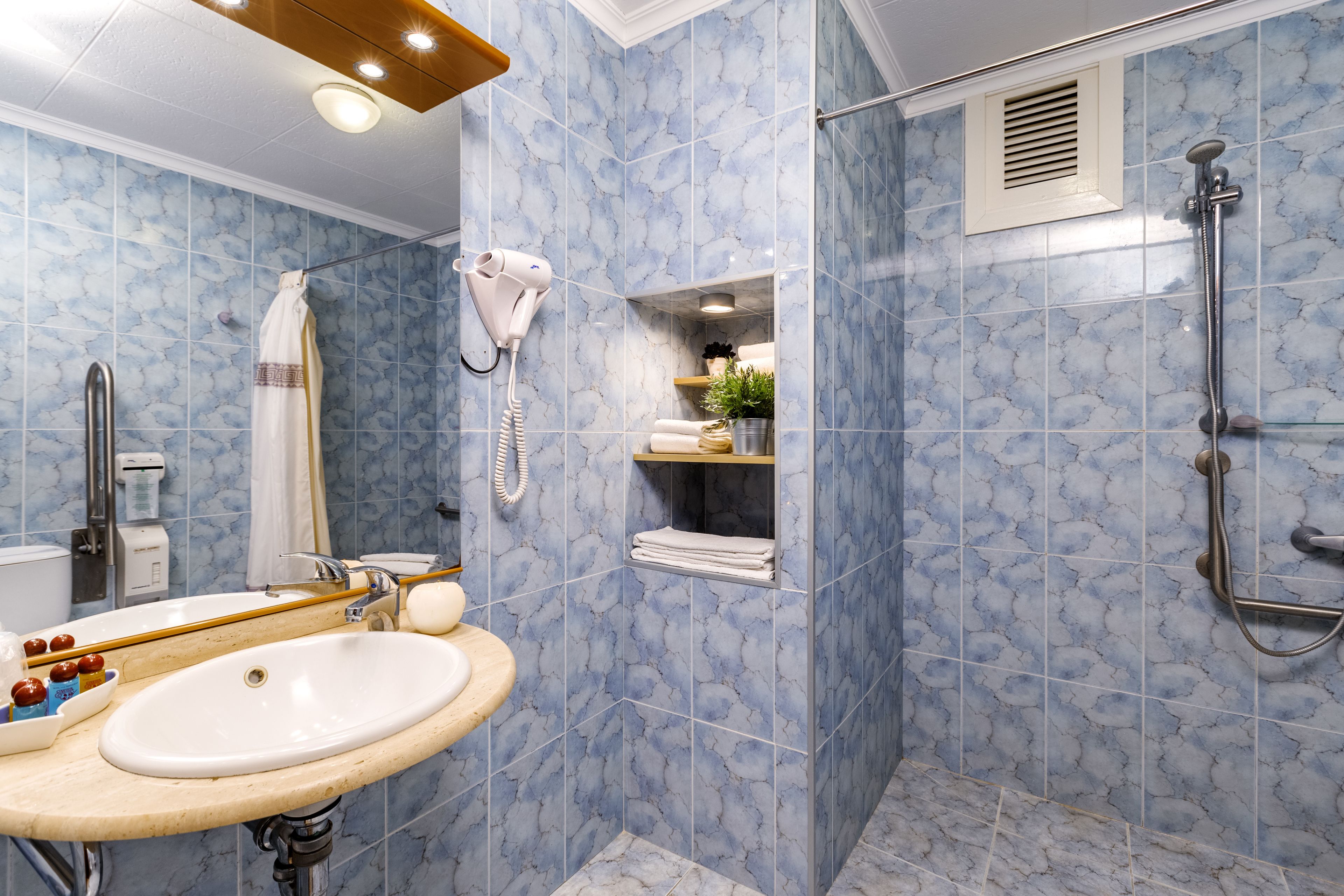 standard double or twin room | bathroom | rainfall showerhead, hair dryer, towels, soap