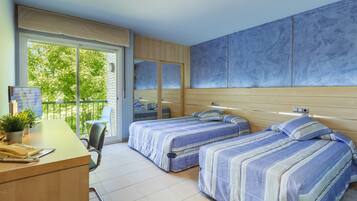 Down comforters, desk, laptop workspace, blackout drapes