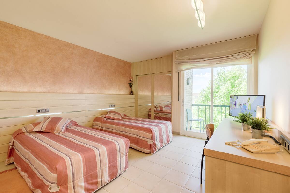 down duvets, desk, laptop workspace, blackout curtains